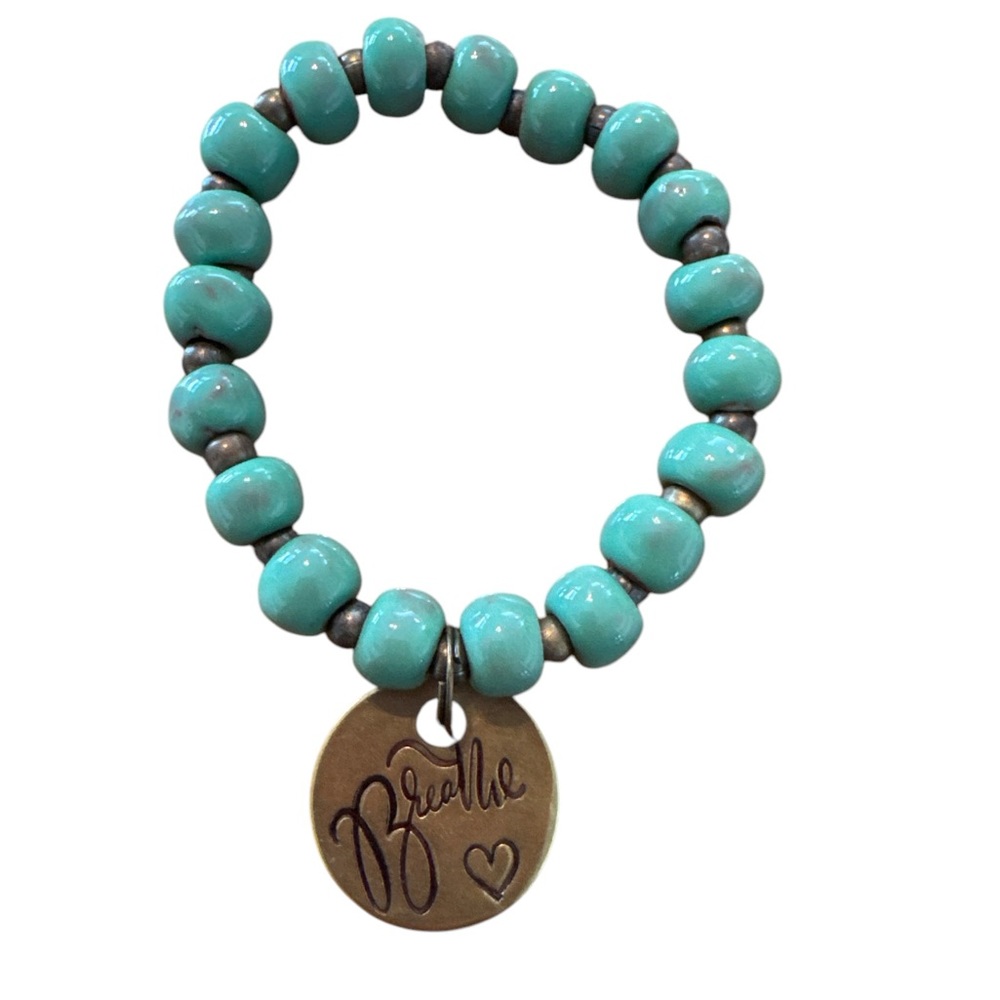Turquoise Beaded Bracelet with Gold Charm that reads Breathe with a heart